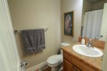 Full upstairs bathroom with dual flush toilet